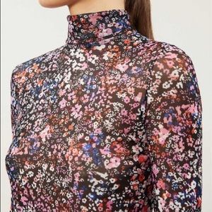 Maje floral print mesh turtle neck top.